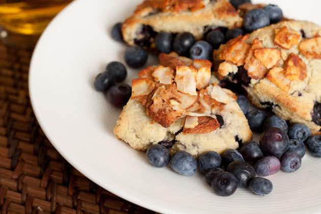 almond treats on a plate with blueberries