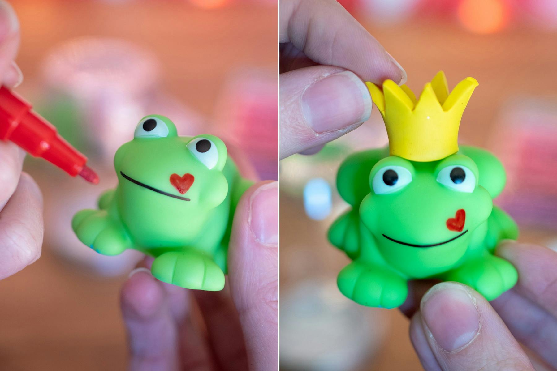 someone drawing a heart on toy frogs face and putting crown on it