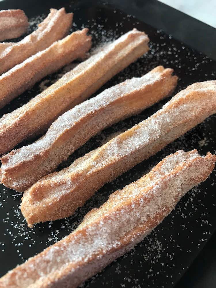churros covered in sugar 