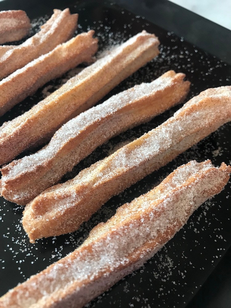 churros covered in sugar 