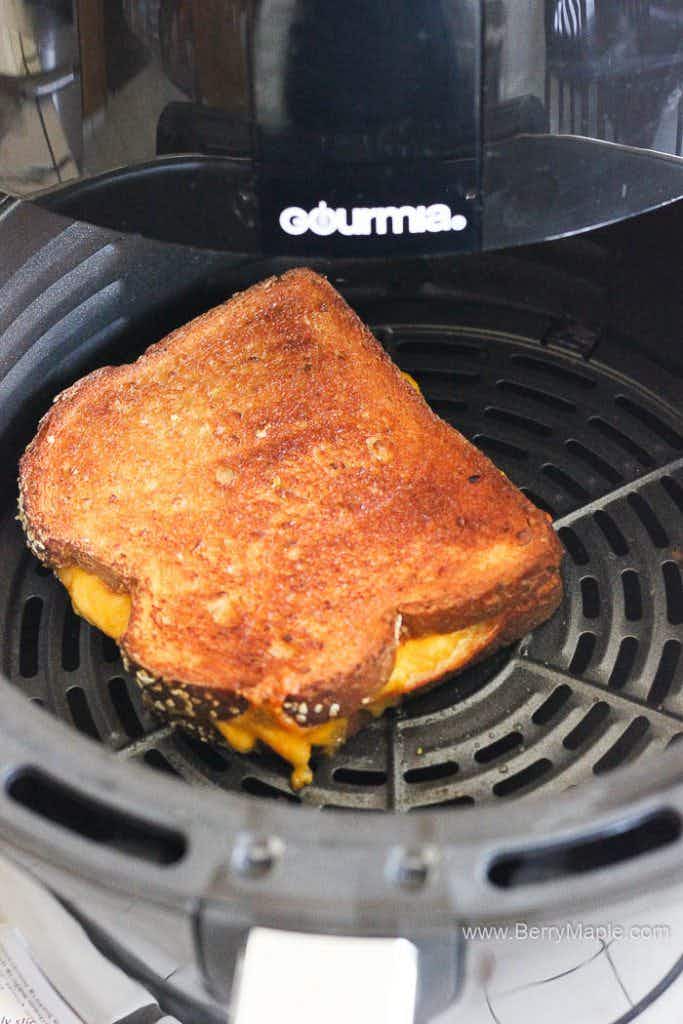 A grilled cheese sandwich in an air fryer