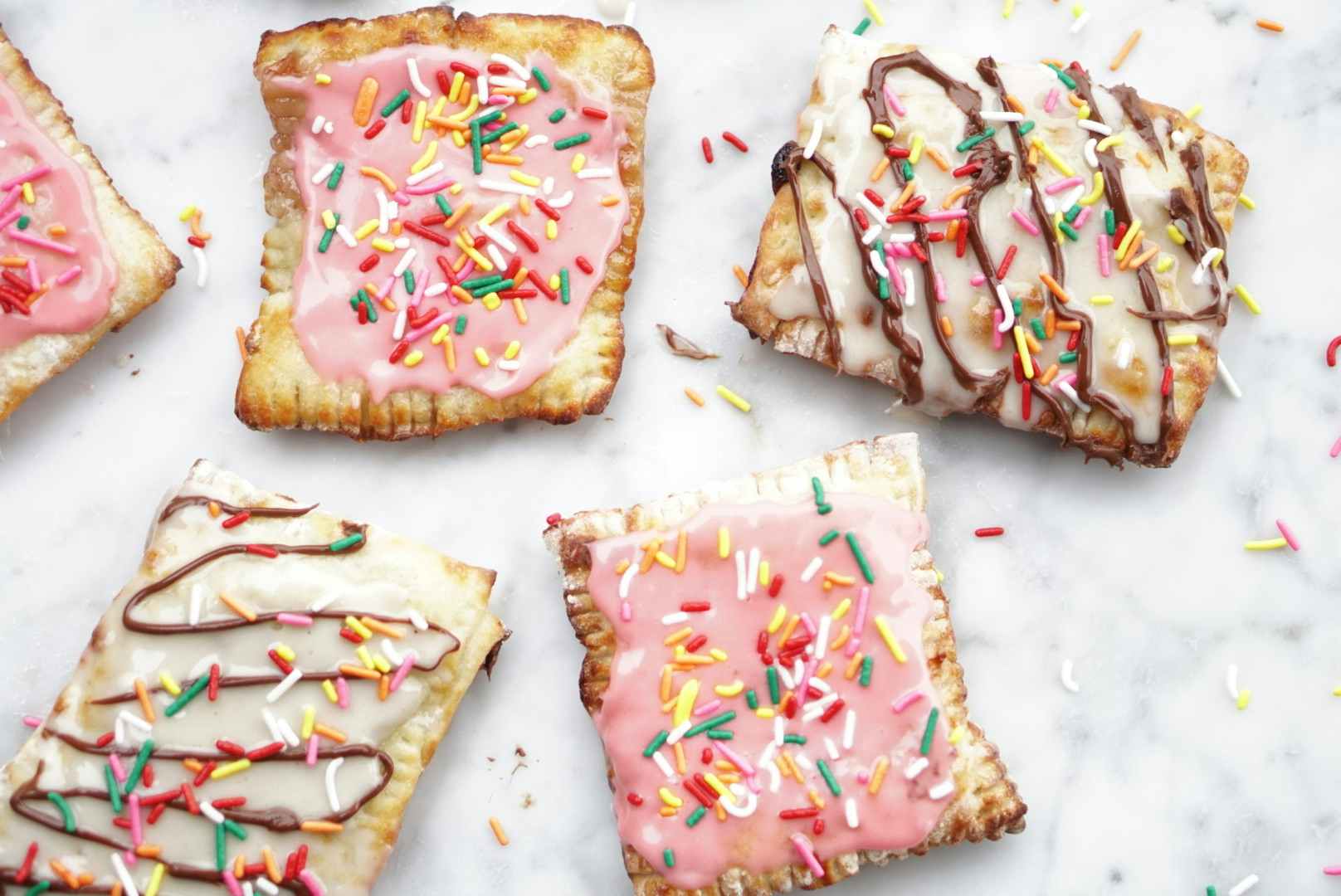 air fryer pop tarts with colorful icing and sprinkles