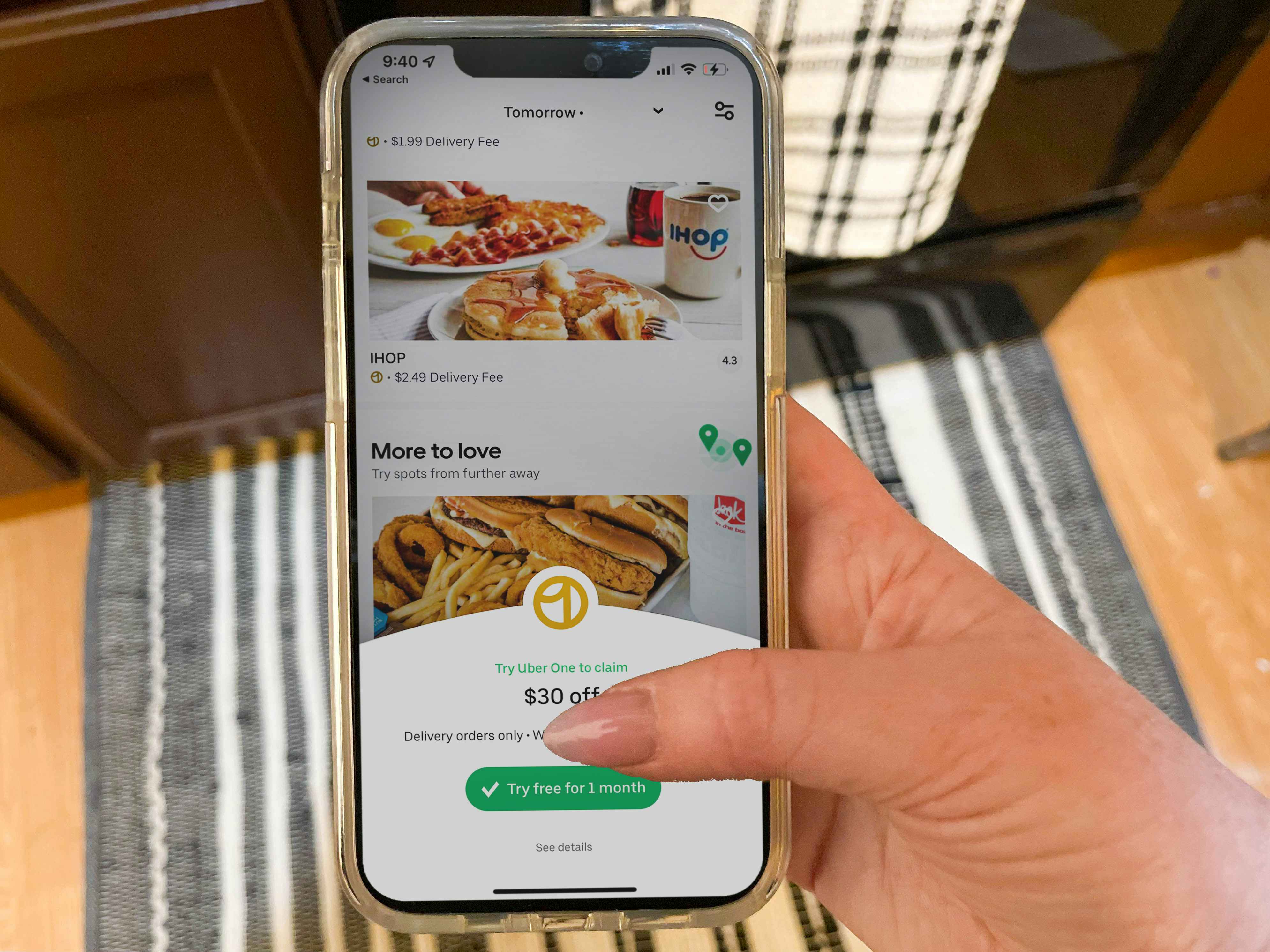 hand holding cellphone with ihop on uber eats