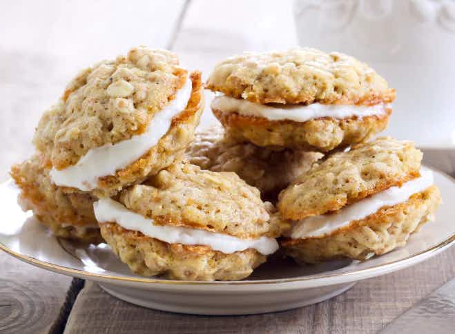 homemade oatmeal cookie sandwiches on a plate