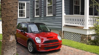 red car beside the house 1547062370