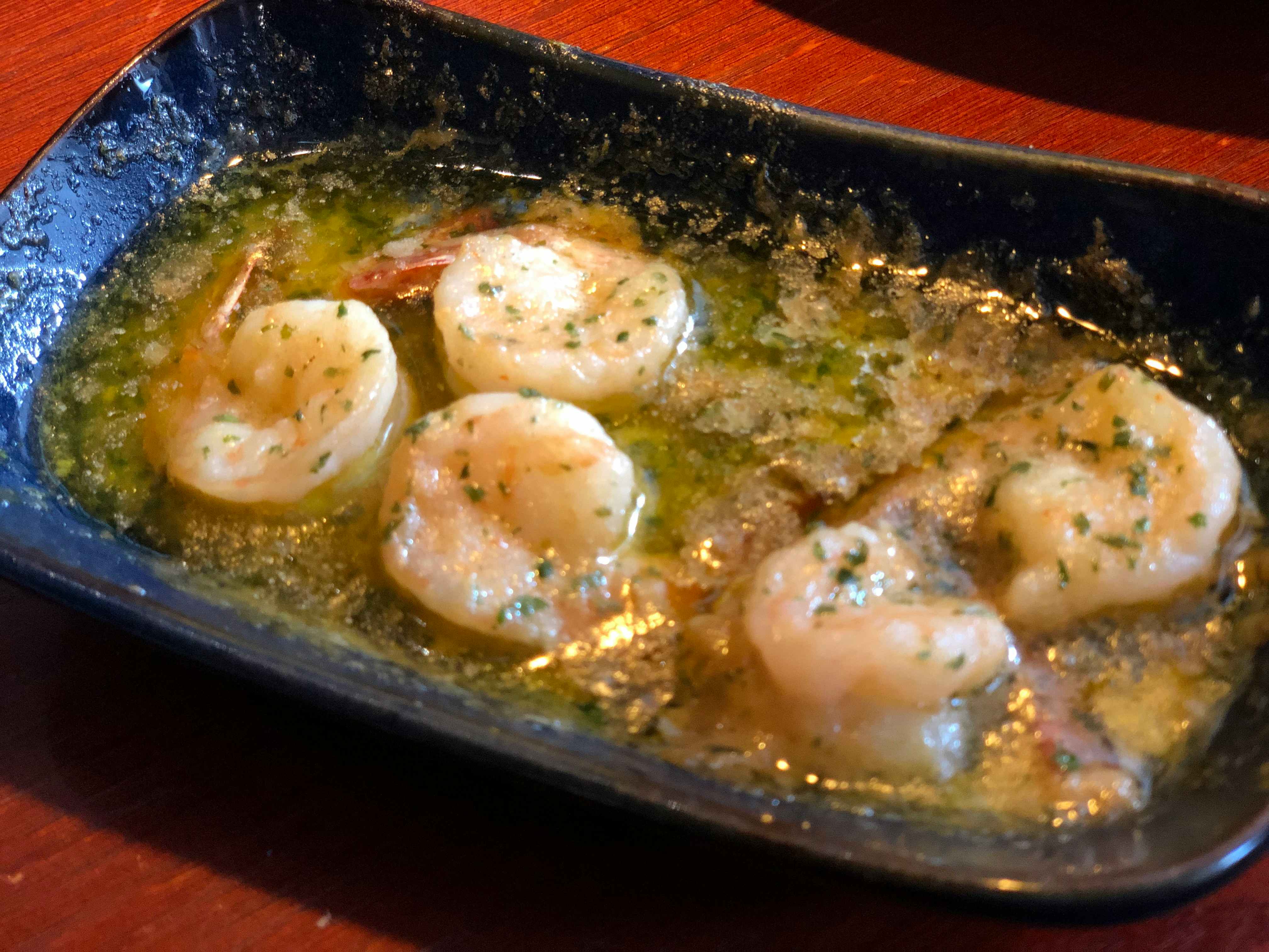 a bowl of garlic butter shrimp scampi 