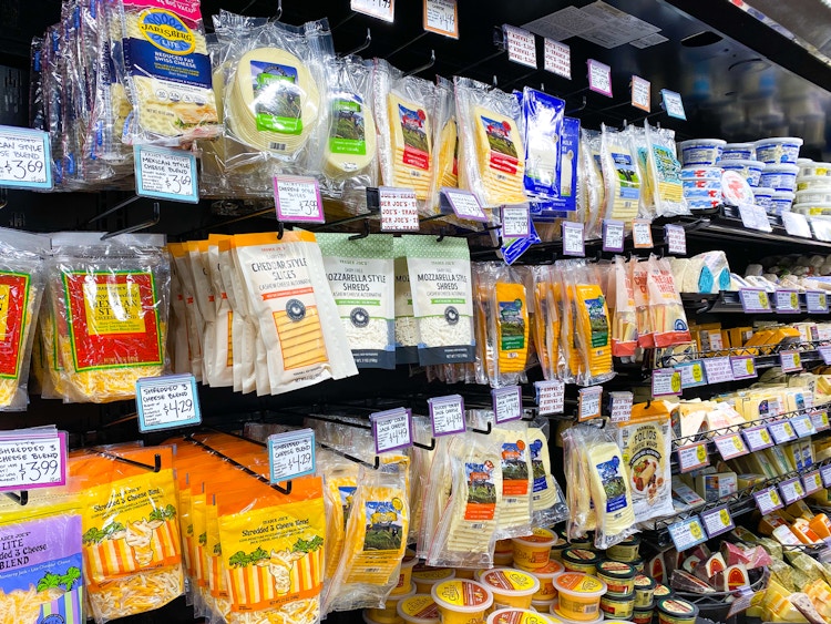 various trader joes sliced and shredded cheese packages