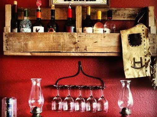 DIY Farmhouse: Turn an old rake into a wine glass holder for free.