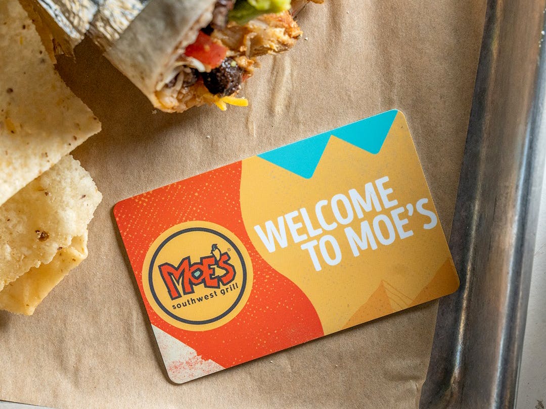 moes southwest grill gift card on tray with food