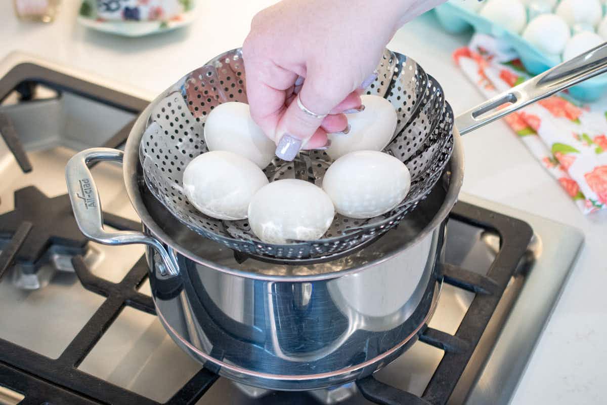 Perfectly cook hard boiled eggs by steaming them.