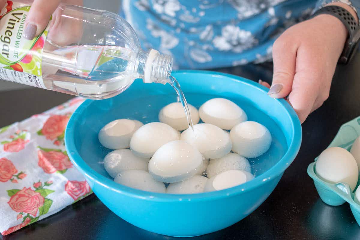 Soak eggs in vinegar for 2 full minutes before dying to get the color to stick.