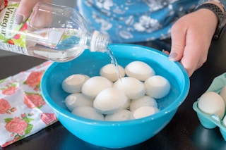 Soak eggs in vinegar for 2 full minutes before dying to get the color to stick.