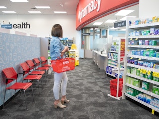 woman standing in cvs pharmacy