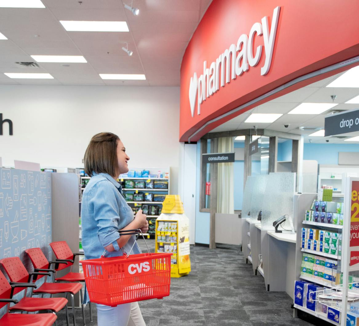 woman standing by cvs pharmacy