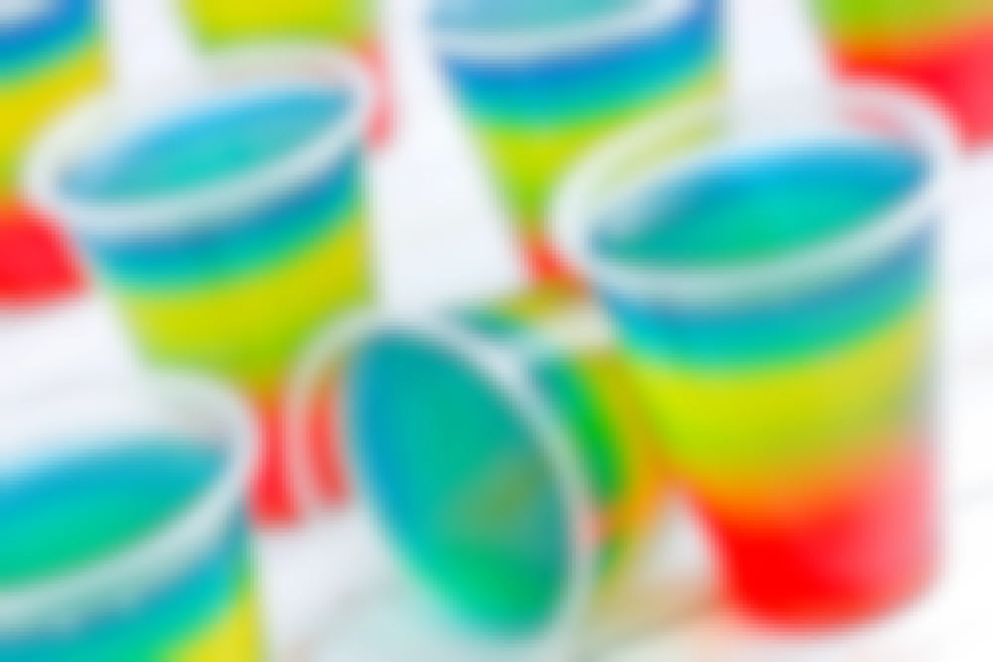 Cups with a rainbow of colorful Jell-O in them