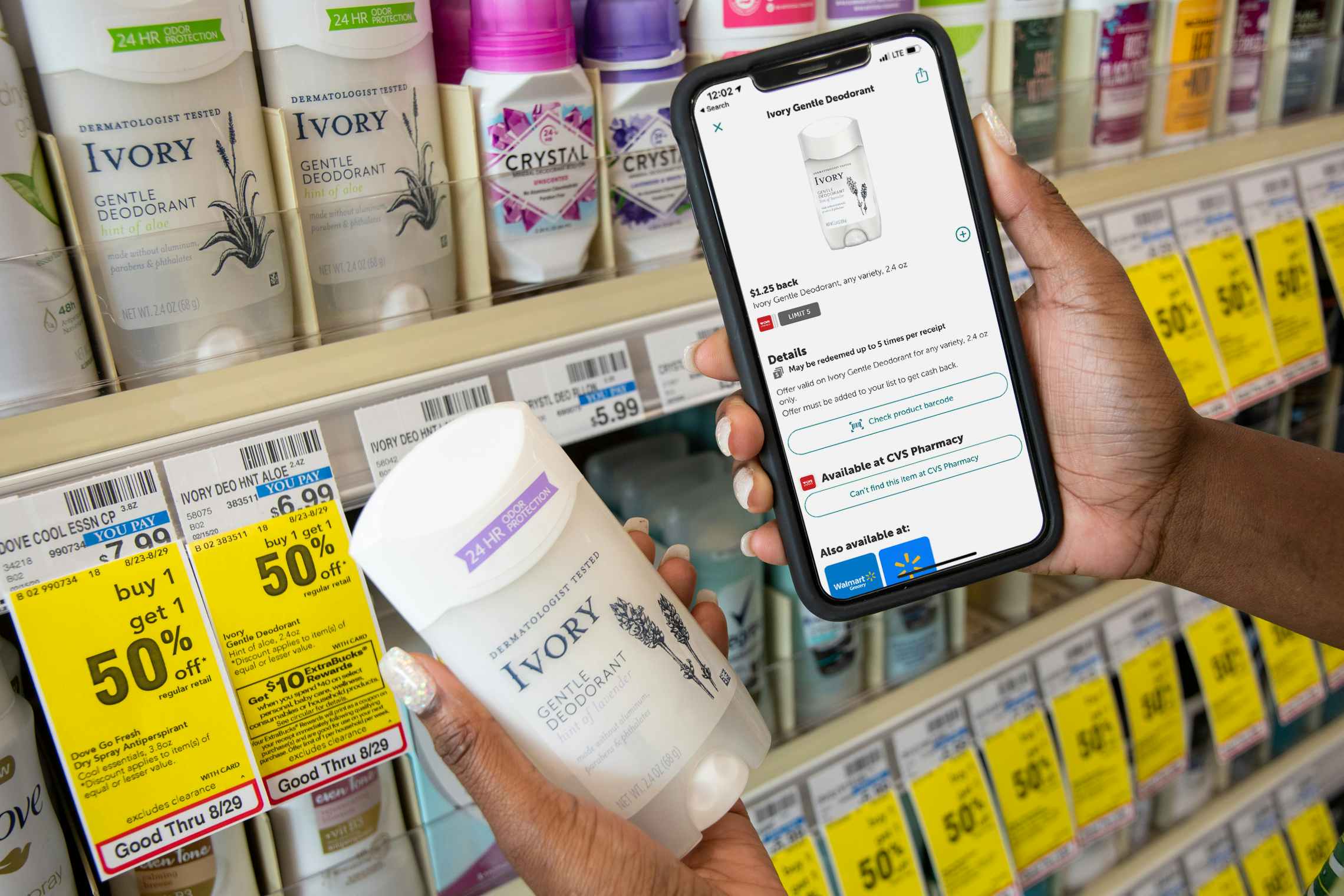 The ibotta app held next to an Ivory deodorant.