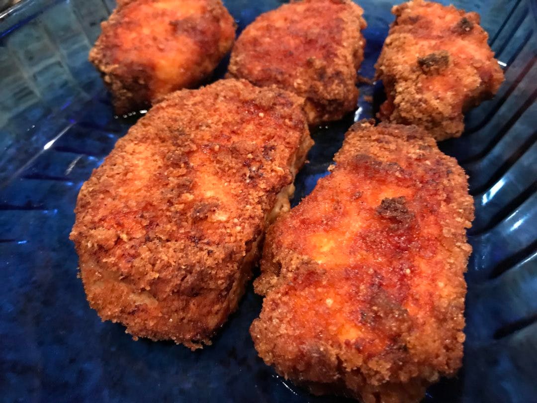 parmesan crusted chicken on a dish