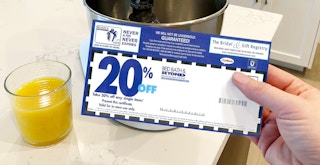 A Bed Bath and Beyond coupon in front of a Kitchenaid