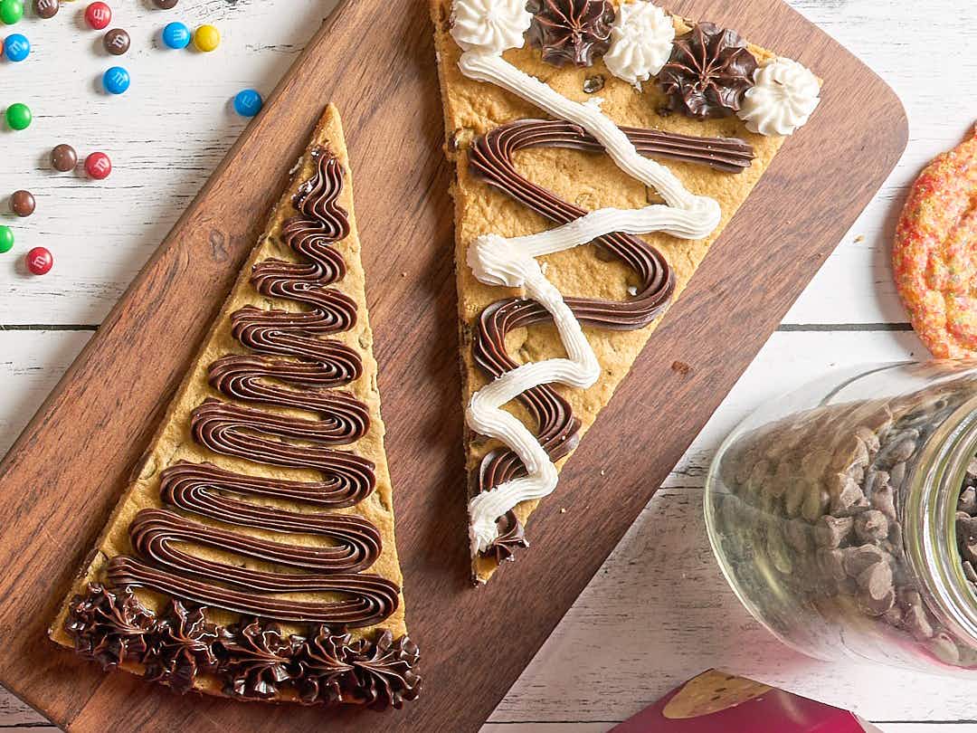 great american cookie cake slices on table