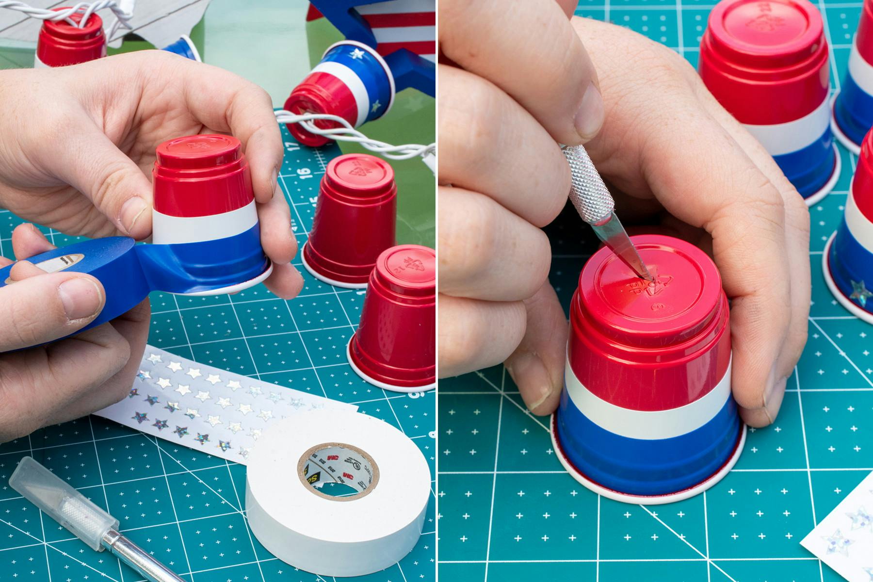 A person's hands using white and blue electrical tape on plastic red shot glass cups to make them red, white, and blue striped, and a person's hand using a knife to cut a small hole into the bottom of the striped cup.