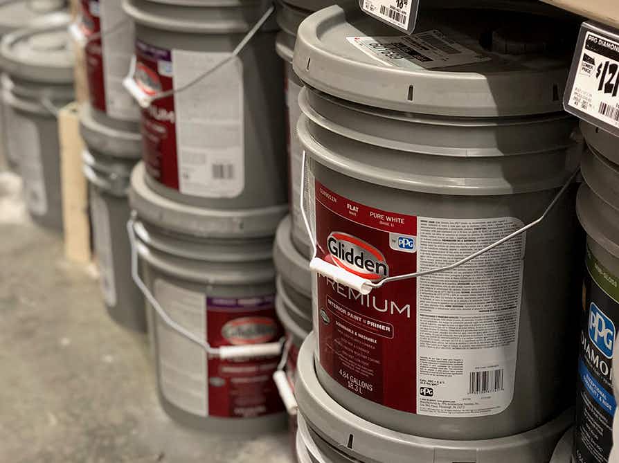 Five gallon buckets of Glidden Premium paint at Home Depot