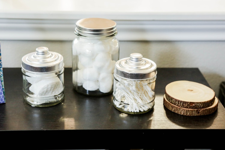 Cotton balls and q-tips in jars from the Dollar Tree.
