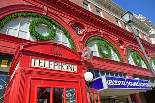 Red phone booth in front of Leciester Square stop at Wizarding World of Harry Pott