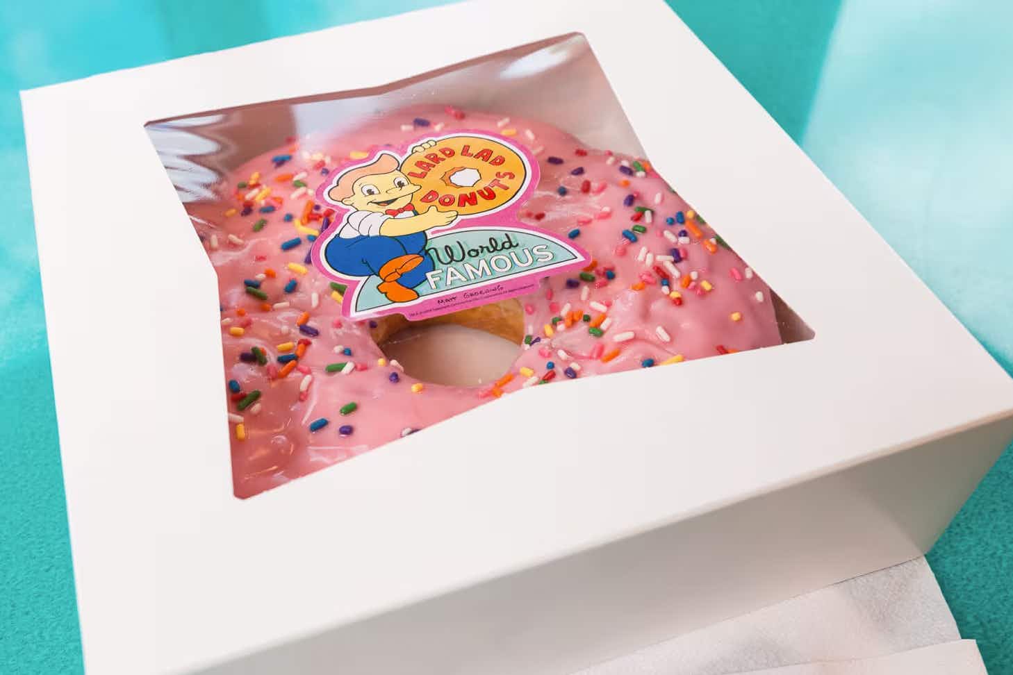 A giant donut in a box at Lard Lad Donuts restaurant at Universal Orlando