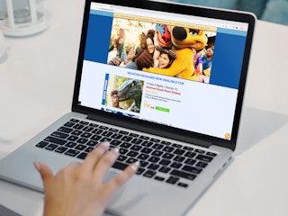 a person looking at third party universal tickets on their macbook