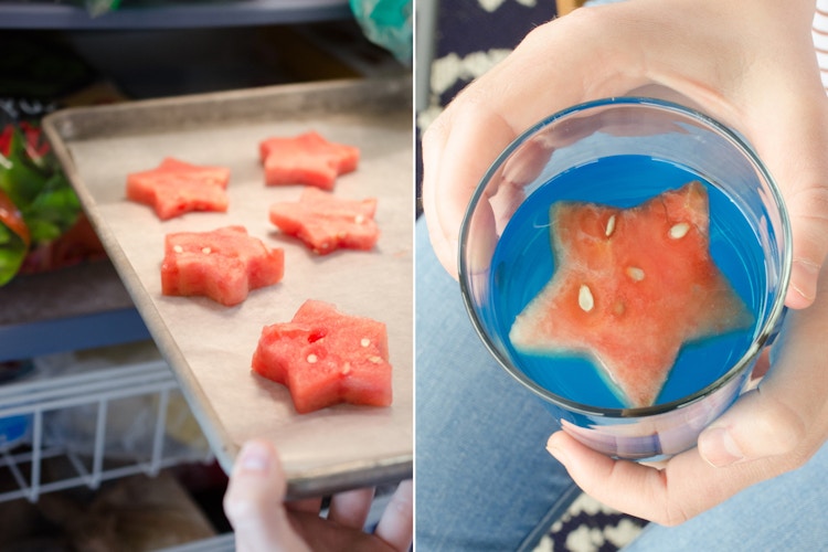 A person placing a tray of star-shaped watermelon pieces into a freezer, and a watermelon ice cube floating in a blue drink.