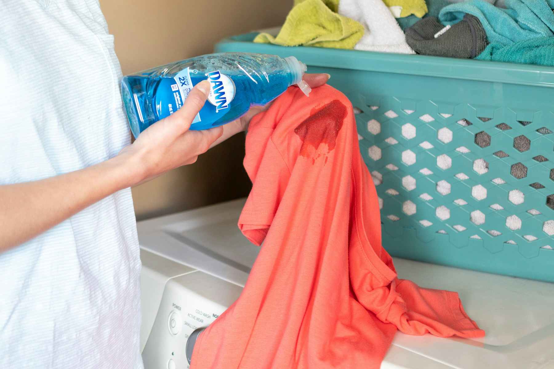 Pre-treat grease stains on clothing with Dawn dish soap.
