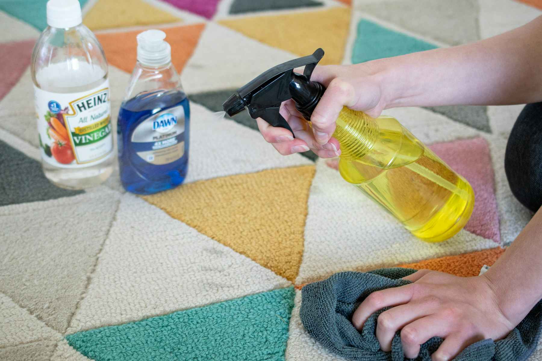 Clean carpet stains with Dawn dish soap, white vinegar, and water.