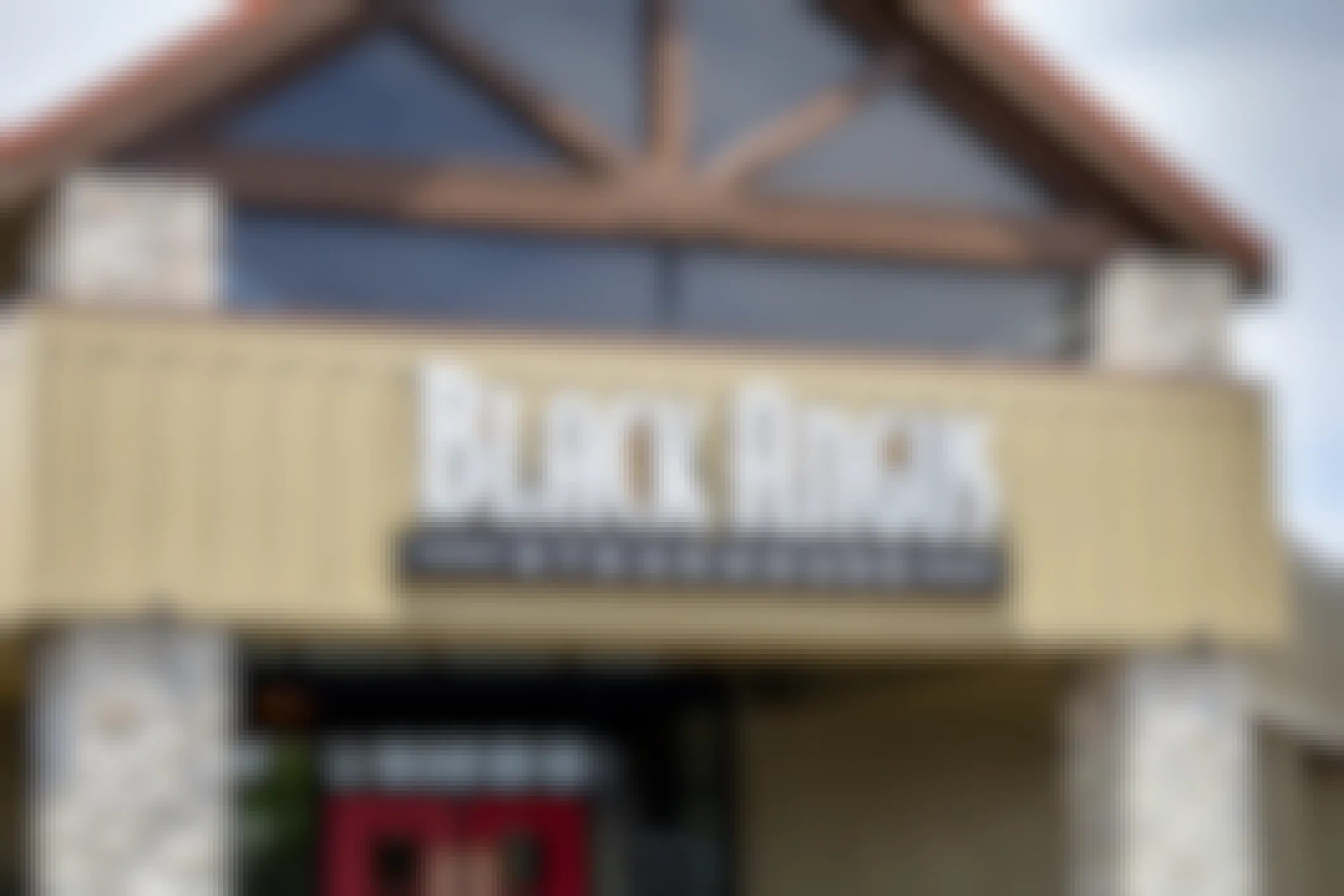 The front of a Black Angus restaurant.