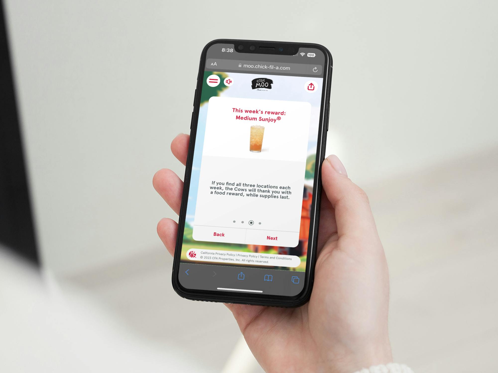 Someone looking at a reward from the Chick-fil-A Code Moo game on their phone