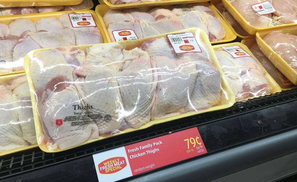 Chicken breasts in store packaging.
