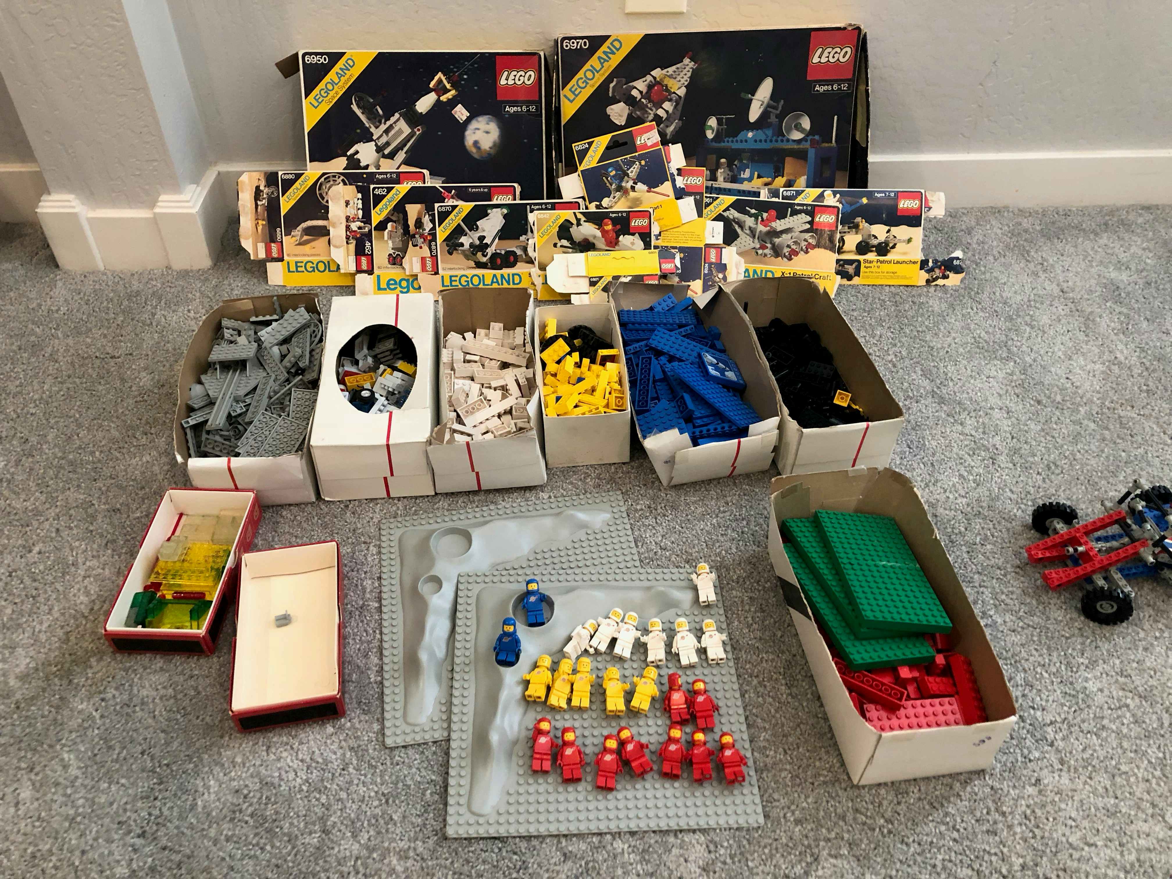 lego sets laid out on the floor