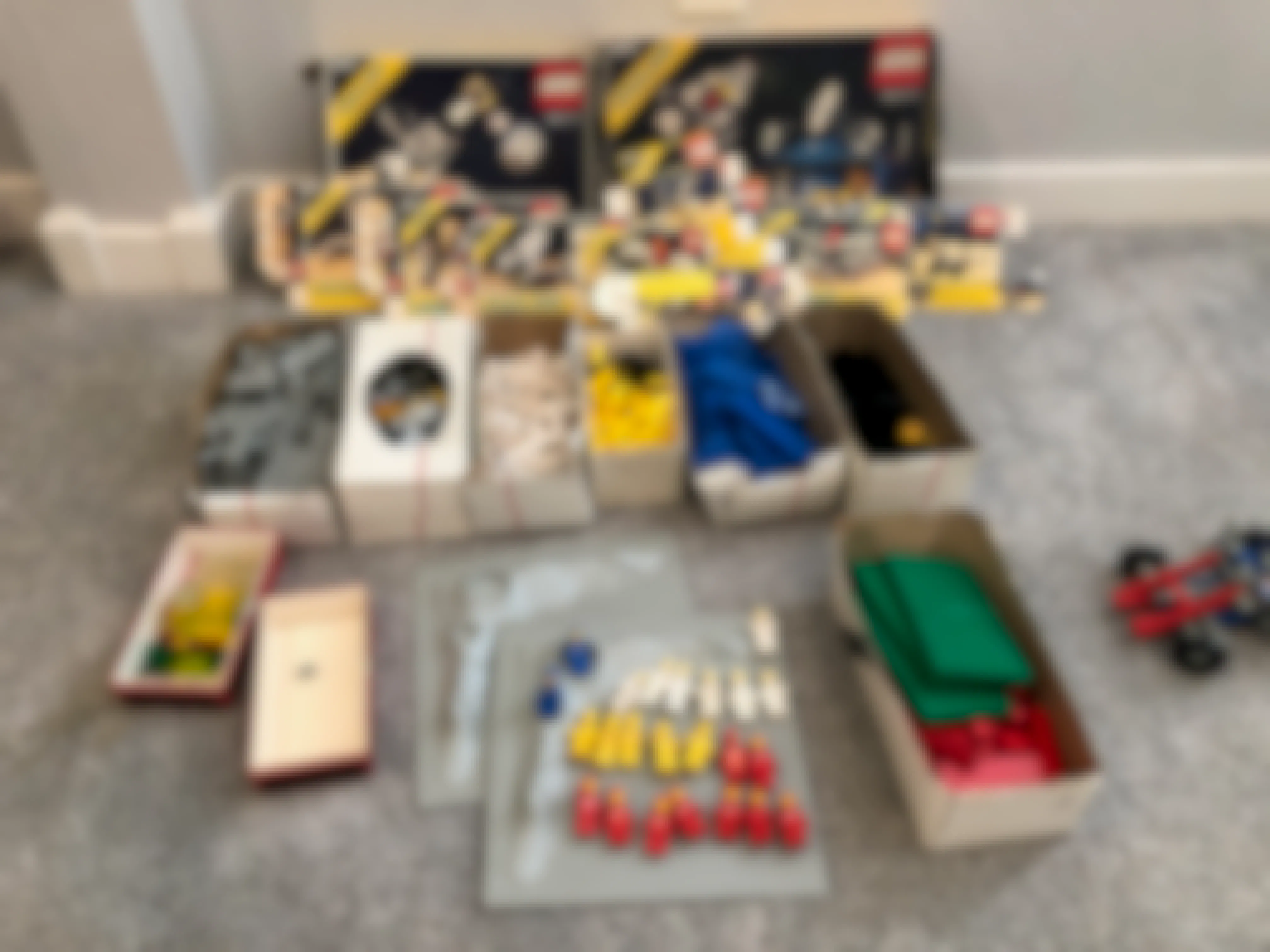 lego sets laid out on the floor