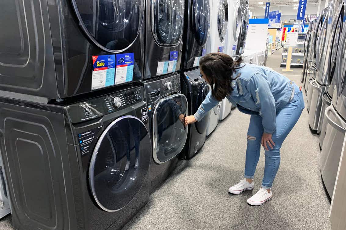someone looking at appliances at Best Buy