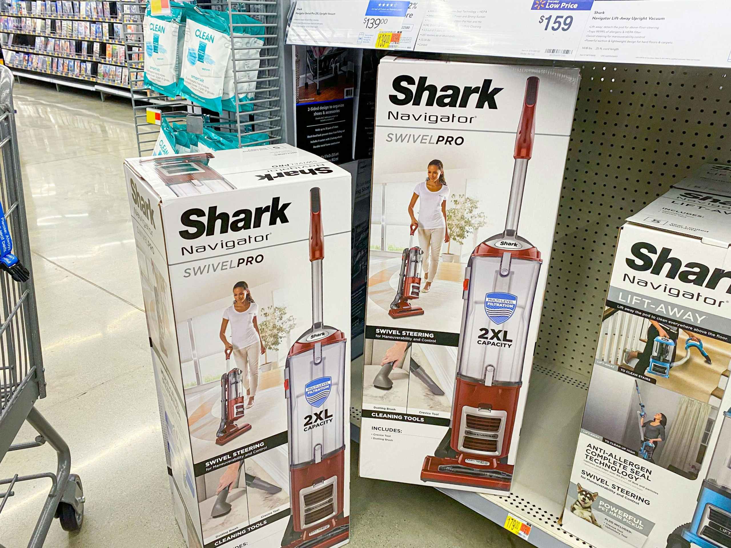 shark navigator swivel pro vacuums on shelf at walmart store