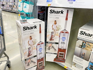 shark navigator swivel pro vacuums on shelf at walmart store