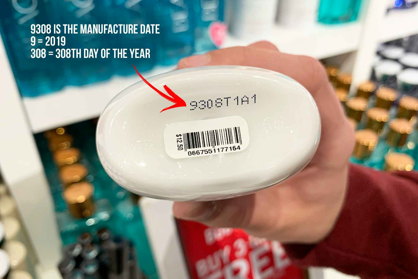 A Bath and Body Works bottle with a code printed on the bottom that reads 9308T1A1 and some added text explaining the code that says, "9308 is the Manufacture date, 9 = 2019, 308 = 308th day of the year