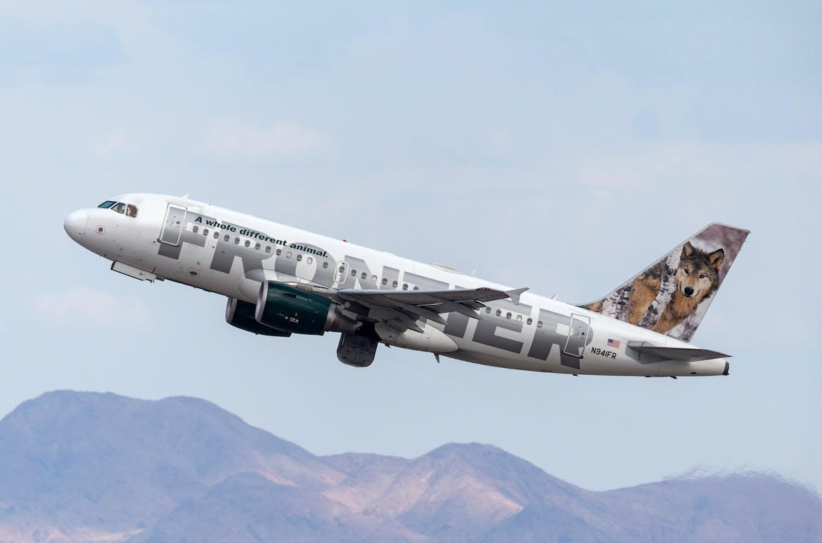 A Frontier Airlines plane taking off
