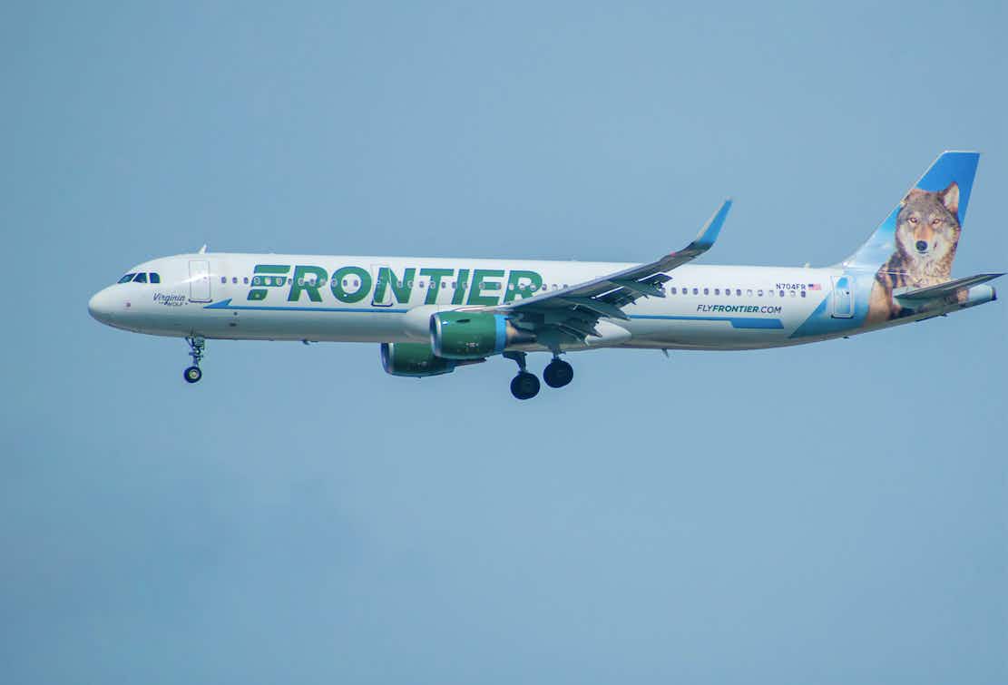 A Frontier plane mid-flight.