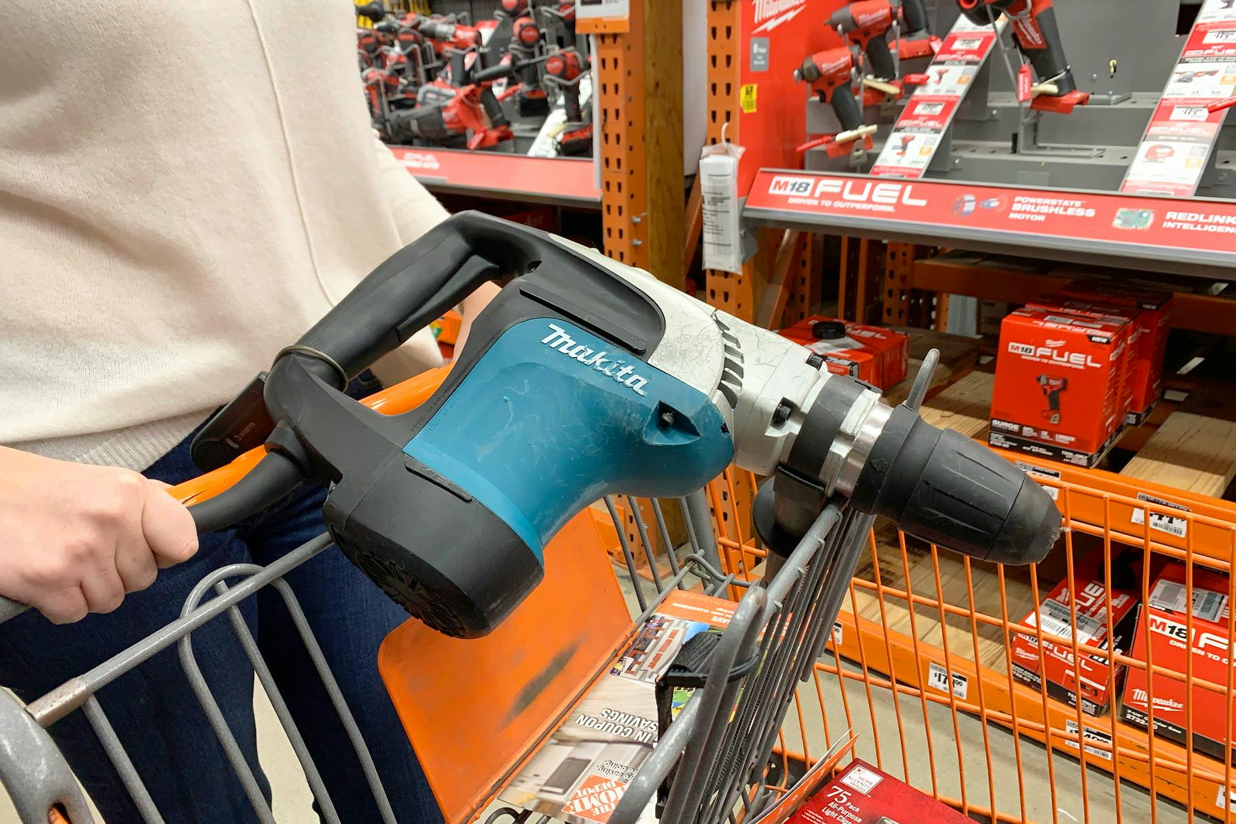 An old tool in a shopping cart.
