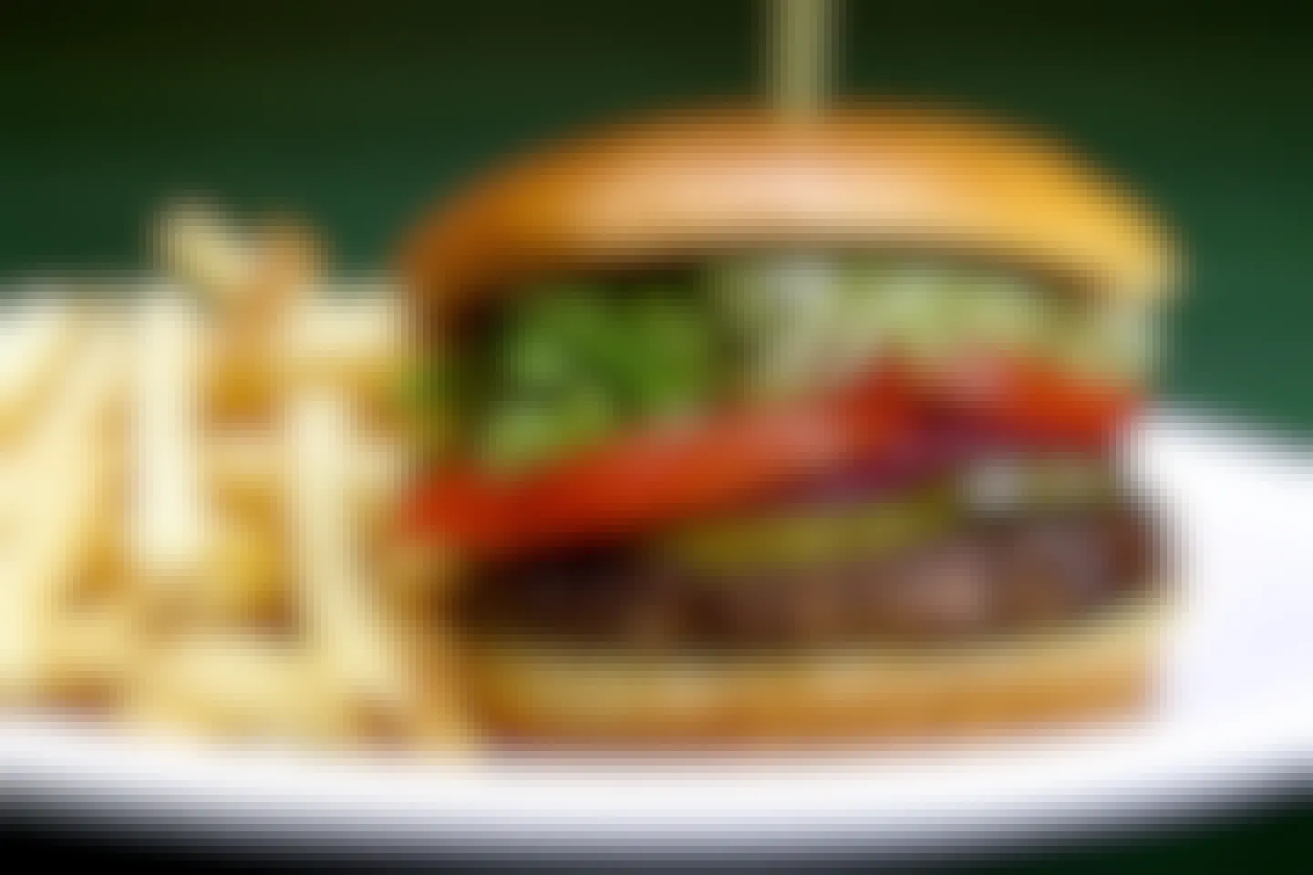 A close up on a Beef 'O' Brady's hamburger and fries