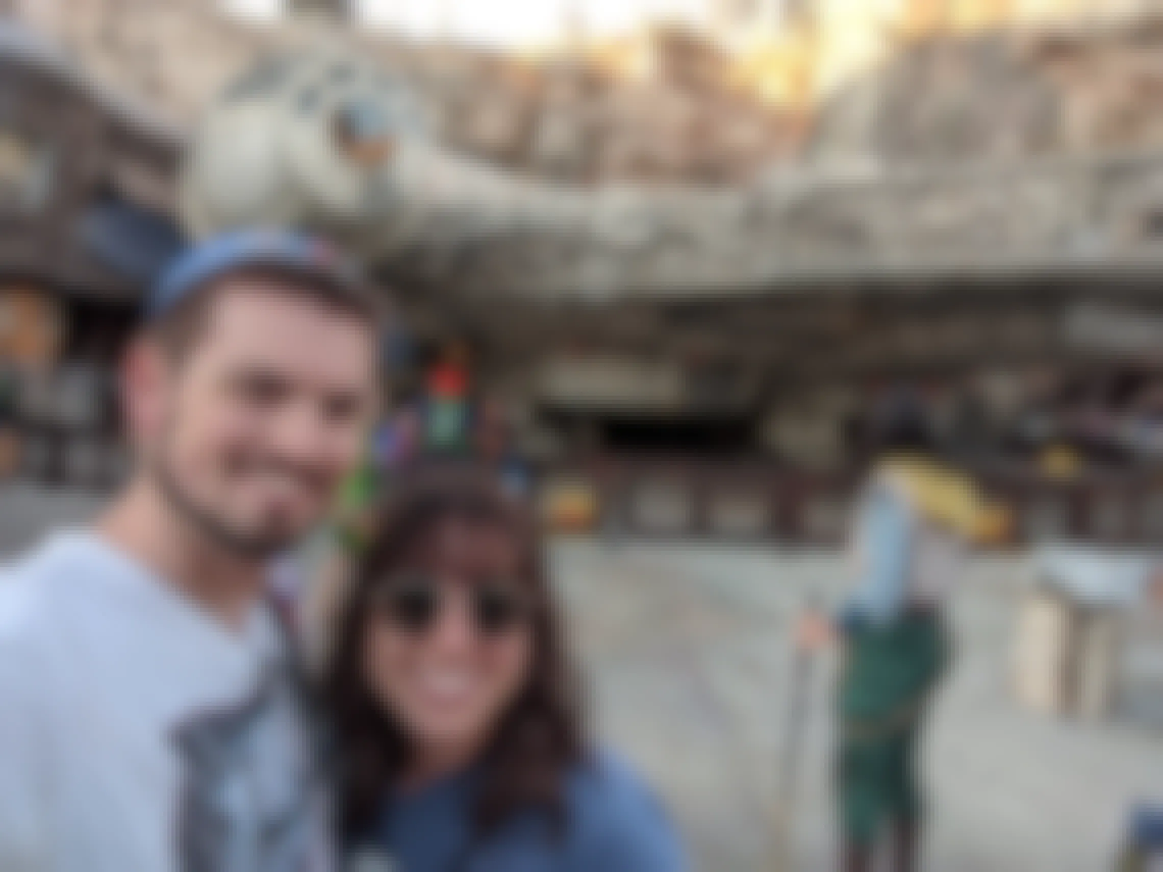 two people in front of star wars ride