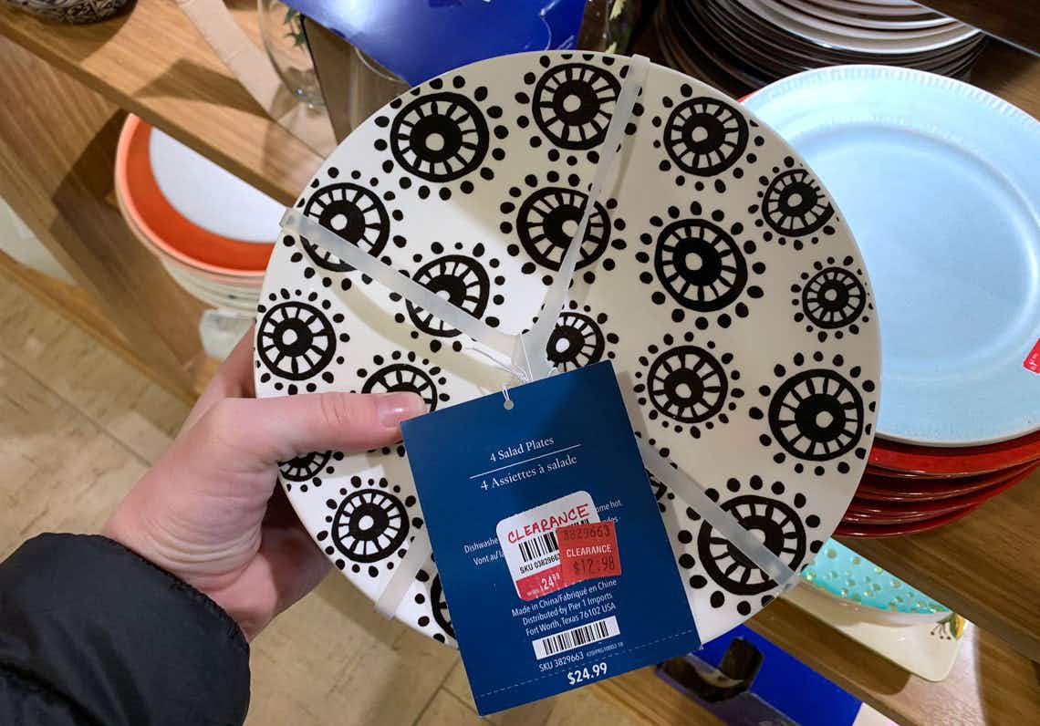 A black and white plate on sale at Pier 1