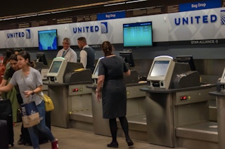 people standing by united desk