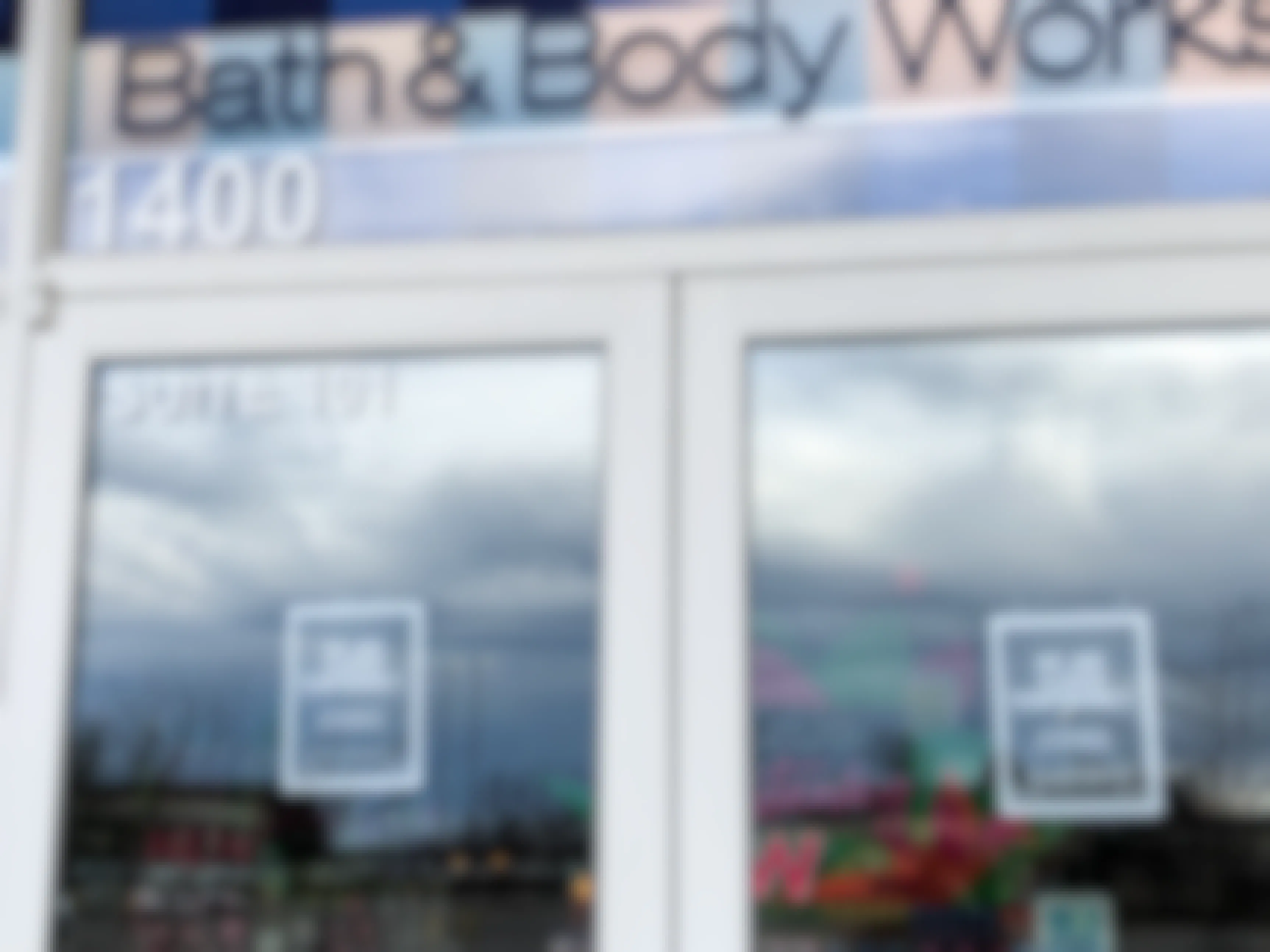 The front of the Bath and Body works store with a closed sign for coronavirus.