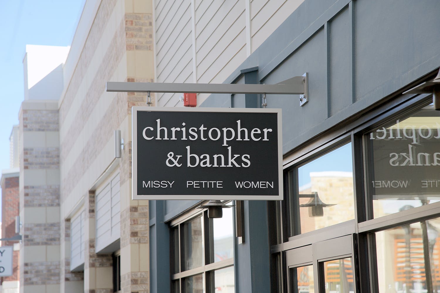 Christoper & Banks clothing store sign hanging outside the building